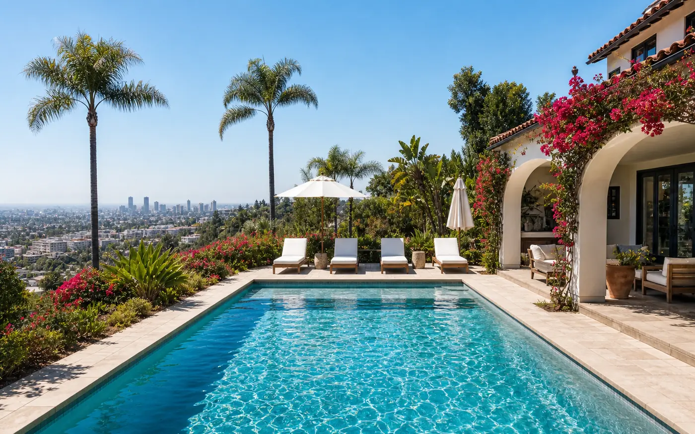Los Angeles, CA residential backyard pool with regionally specific landscaping.